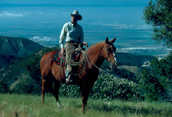Bill Dorrance on horseback in the California hills