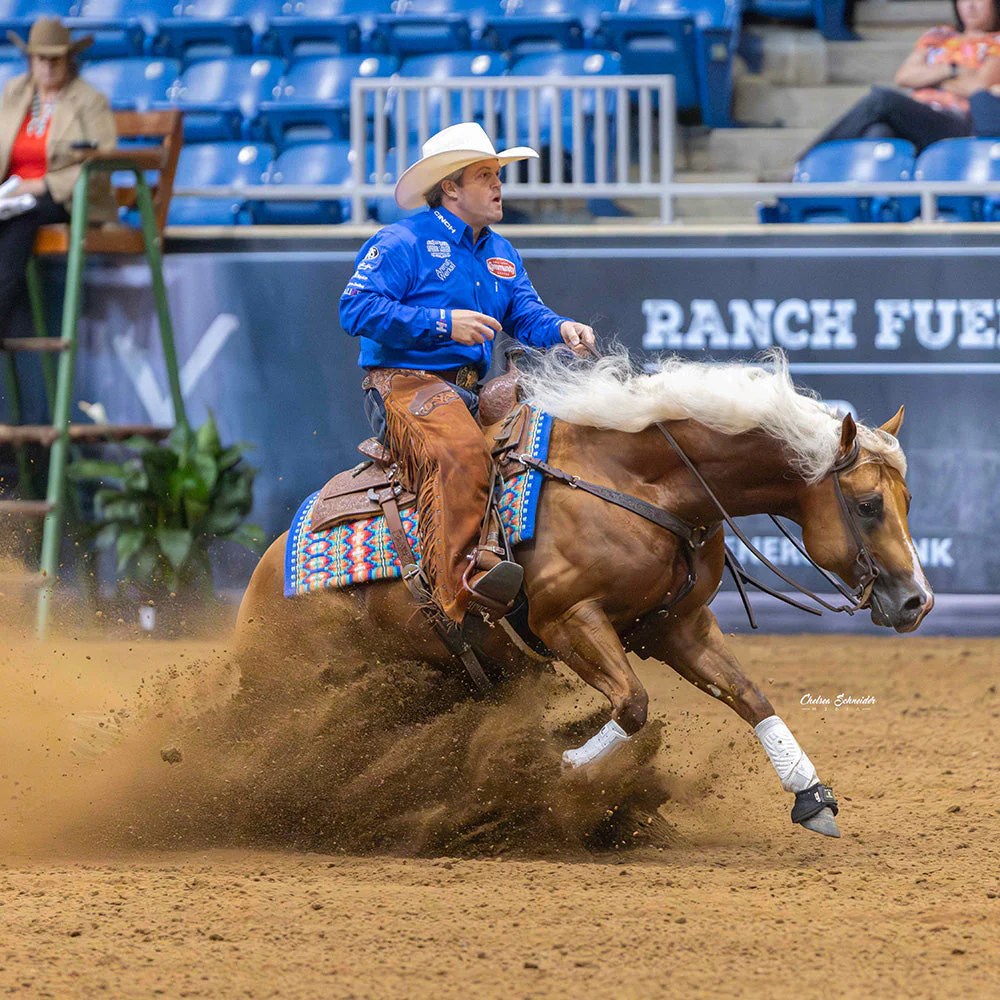 Casey Deary executing a sliding stop in reining competition