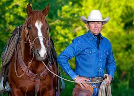 Craig Cameron with a horse — Double Horn Ranch, Bluff Dale, Texas