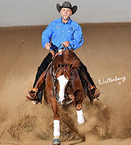 Craig Schmersal competing in reining — sliding stop